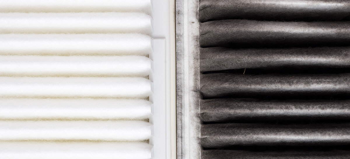 HVAC air filters; one side clean, one dirty.